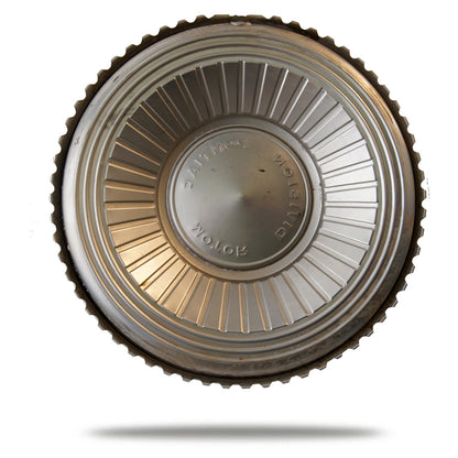Decorative metal dish with gold and silver accents on a white background